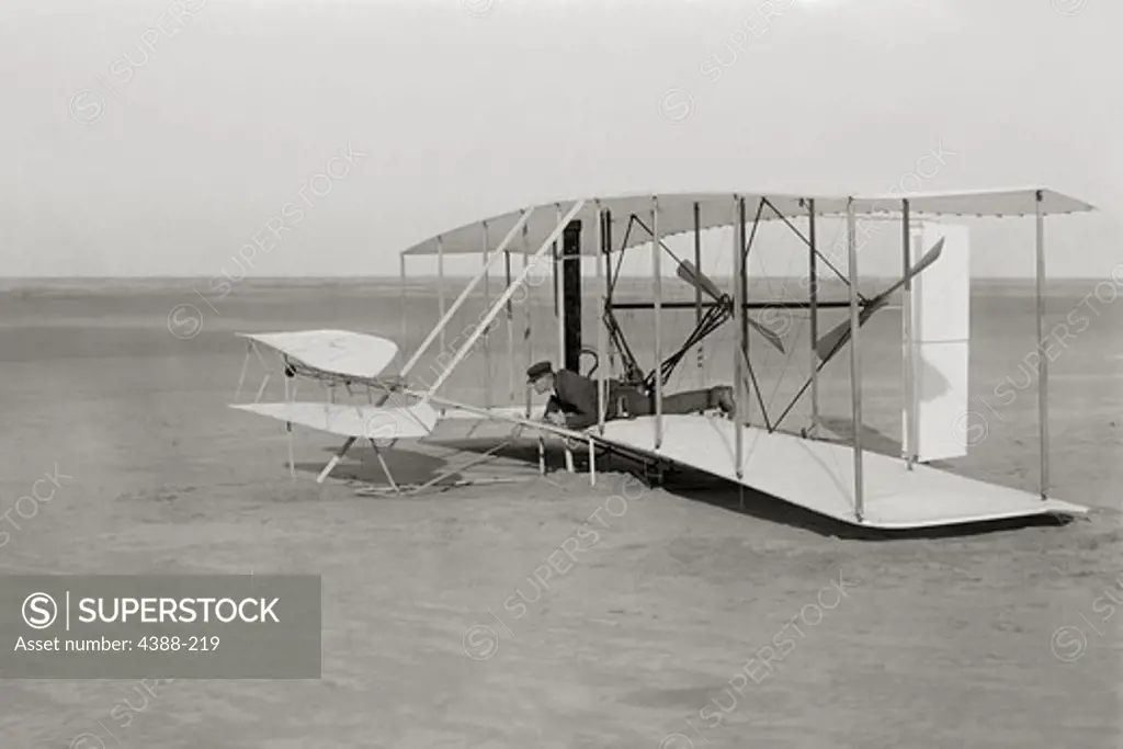 Wilbur Wright in Wright Flyer After Unsuccessful Flight Attempt