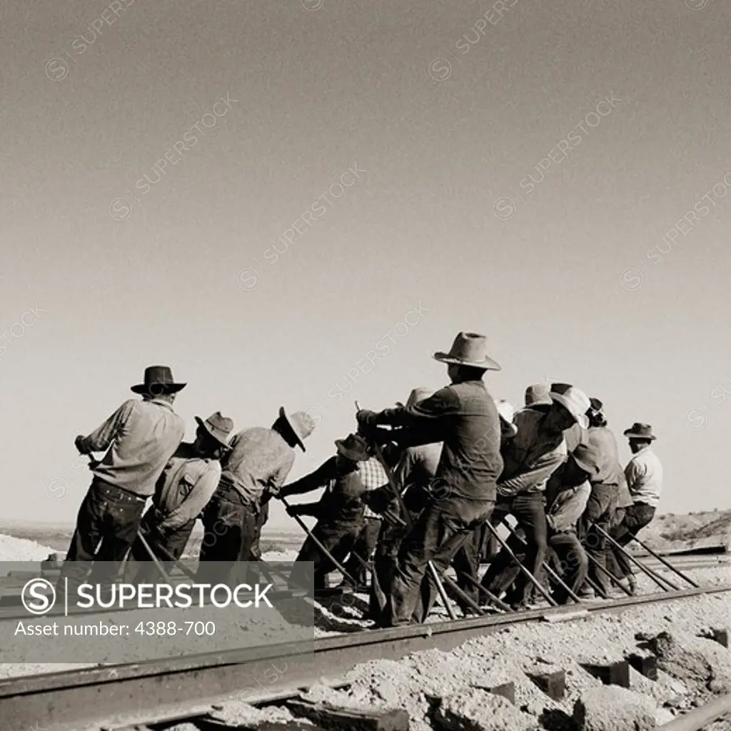 Railroad Workers in Desert