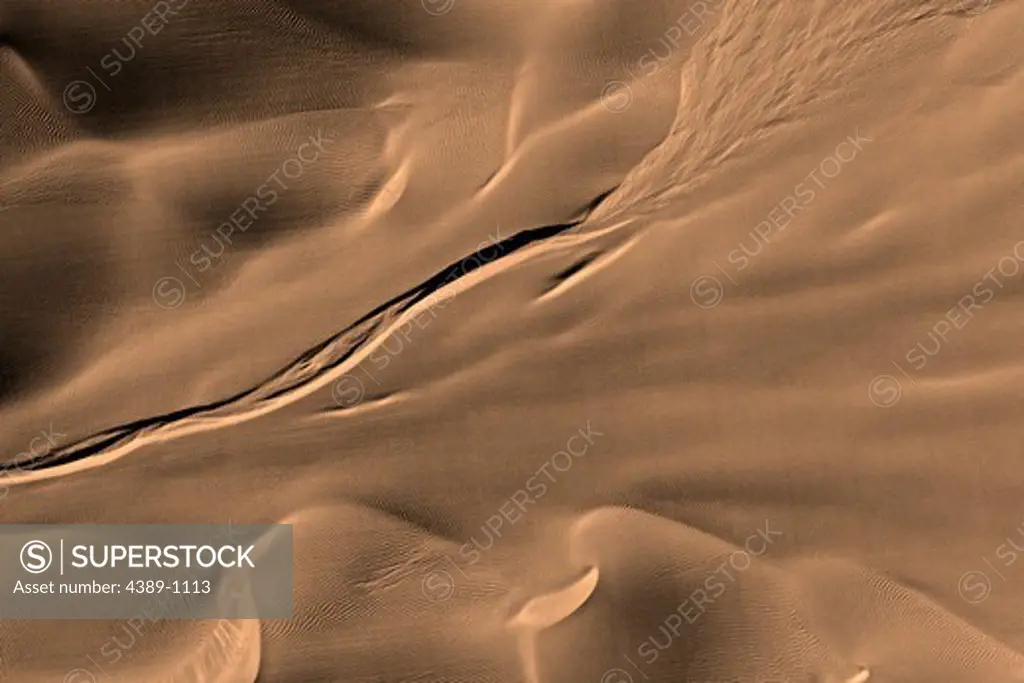 Dunes with Unusual Gully Seen by Mars Reconnaissance Orbiter