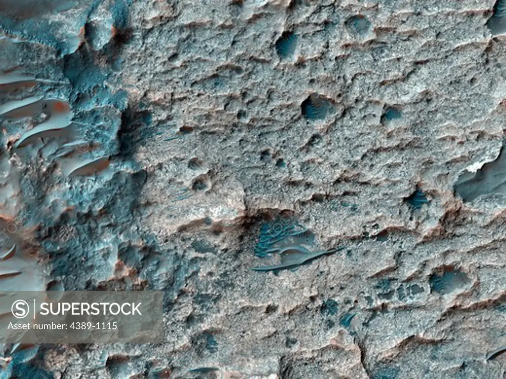 Sand and Rock on a Crater Floor Seen by Mars Reconnaissance Orbiter