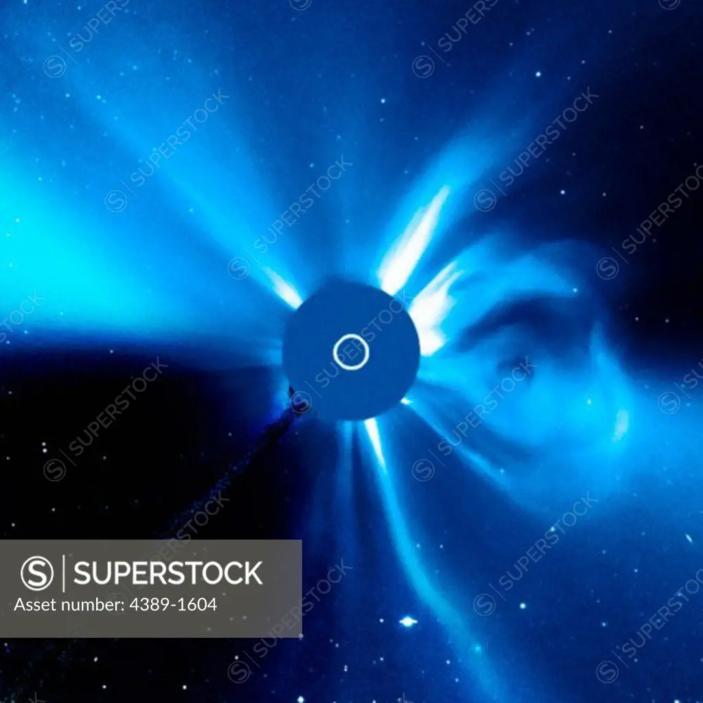 The Large Angle and Spectrometric Coronagraph (LASCO) cameras of the Solar and Heliospheric Observatory (SOHO) satellite captured this image of a solar coronal mass ejection, a wave of electrons and protons, and a small amount of heavier element, streaming from the solar corona.