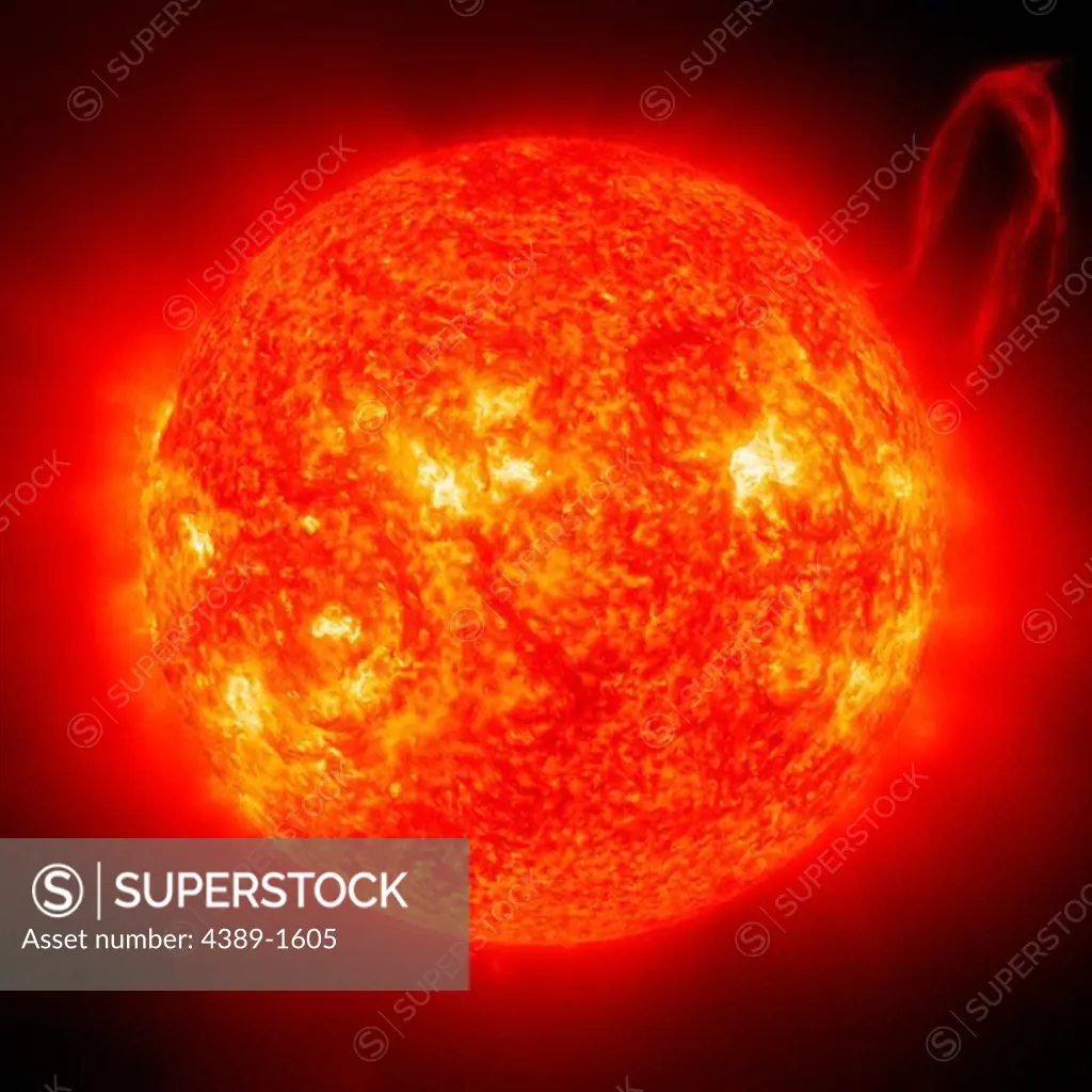 A solar prominence in extreme ultraviolet light (He II at 304 angstroms) breaks away from the Sun. Prominences are huge clouds of relatively cool, dense plasma suspended in the Sun's hot, thin corona. Magnetic fields built up enormous forces that propelled particles out beyond the Sun's surface. Emission in this spectral line shows the upper chromosphere at a temperature of about 60,000 degrees K. To give a sense of scale, the prominence extends about 30 Earths out from the Sun.