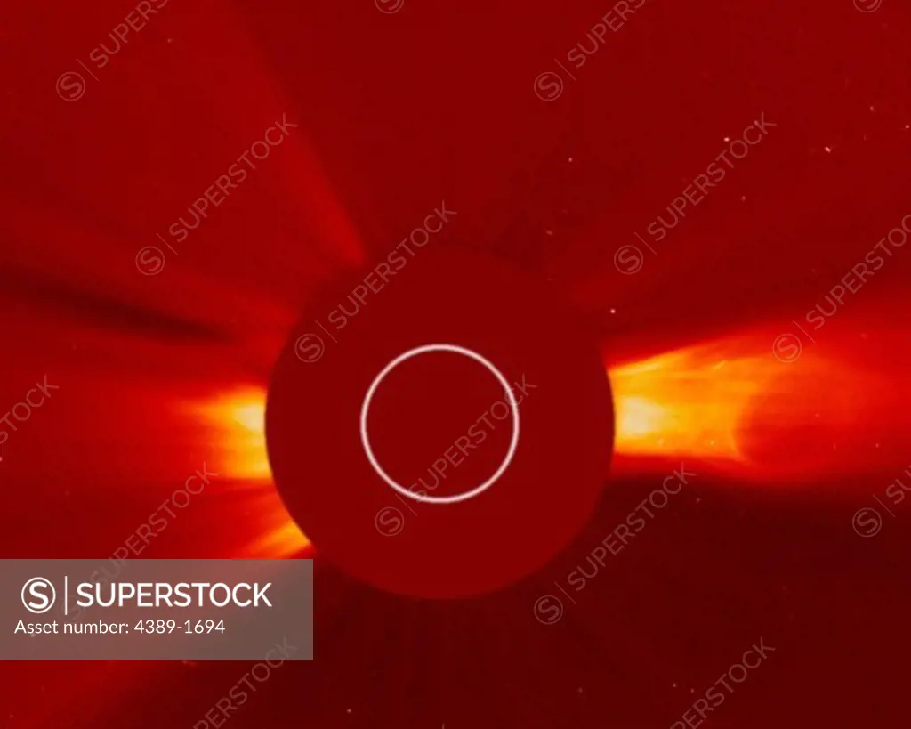 The Sun blows out a coronal mass ejection (CME) that resembles an almost perfectly shaped smoke ring. The image was made by the Solar and Heliospheric Observatory (SOHO)'s C2 coronagraph instrument. The white circle represents the size of the Sun and some area around it being blocked by the red occulting disk to reveal the faint details of the Sun's corona.