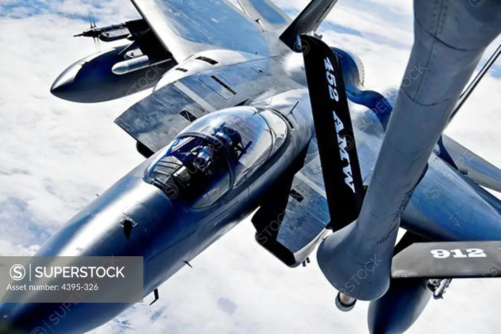 A KC-135 Stratotanker provides aerial refueling to an F-15 Eagle over the Joint Pacific Alaska Range Complex during RED FLAG-Alaska 11-1, April 28, 2011.  The JPARC covers more than 67,000 square miles and enables the military to have the largest air-ground training complex in America.