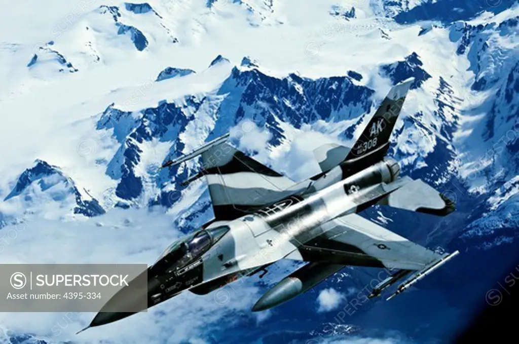 An F-15C Falcon from the 18th Aggressor Squadron, Eielson Air Force Base, Alaska, flies over a mountain range in Alaska during an excercise evolution that is a part of Northern Edge 2011. The U.S. Pacific Command directed excercise is taking place in the Joint Pacific Alaska Range Complex and has brought together nearly 6,000 participants from the U.S. Army, Air Force, Marine Corps, Navy and Coast Guard.