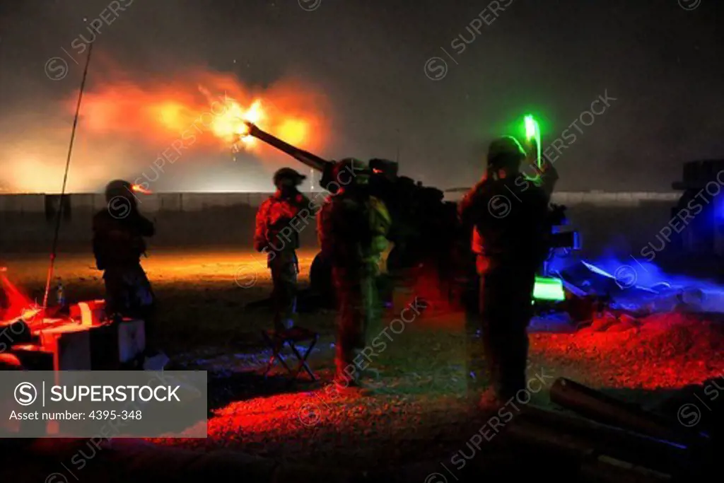 Third Platoon, Bravo Battery of the Automatic Battalion, 2nd Battalion, 8th Field Artillery Regiment, lit up the Zabul province night by firing illumination from their M777A2, 155 mm howitzer at suspected enemy movements from FOB Pasab, Zharay District, Zabul province, Afghanistan, July 20. (Photo by Sgt. Christopher McCann)