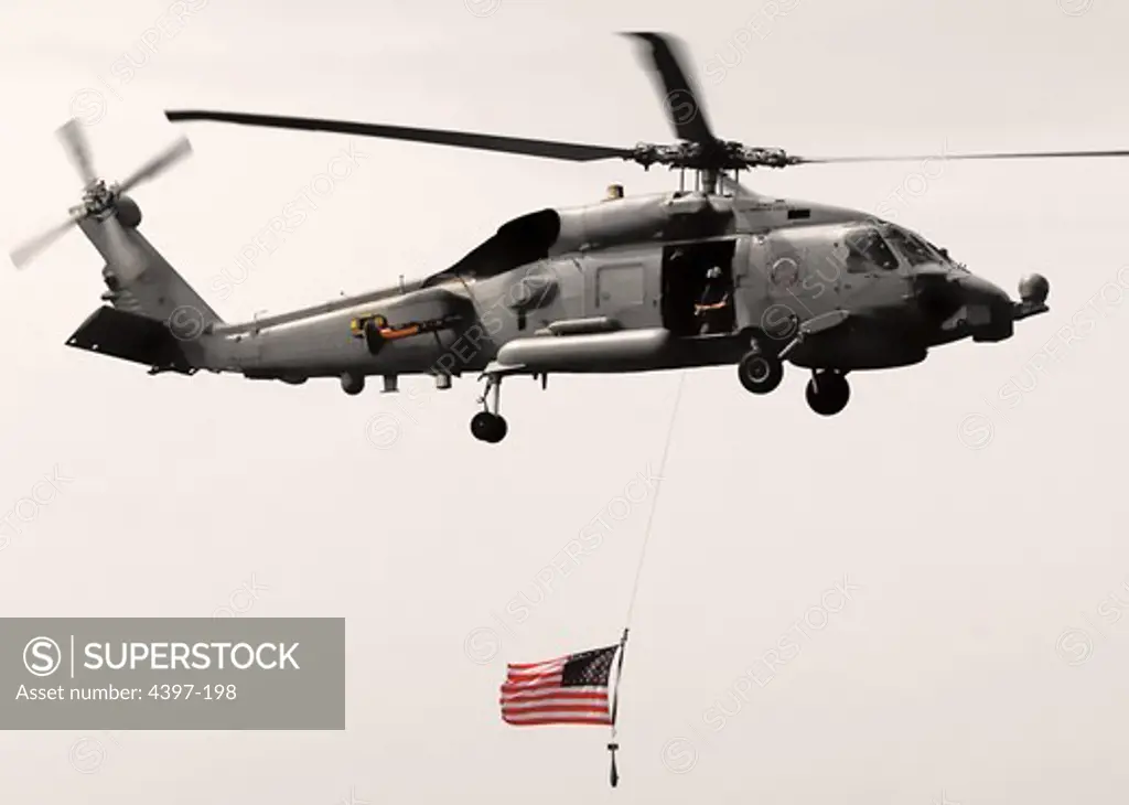 SH-60 Seahawk Flying American Flag