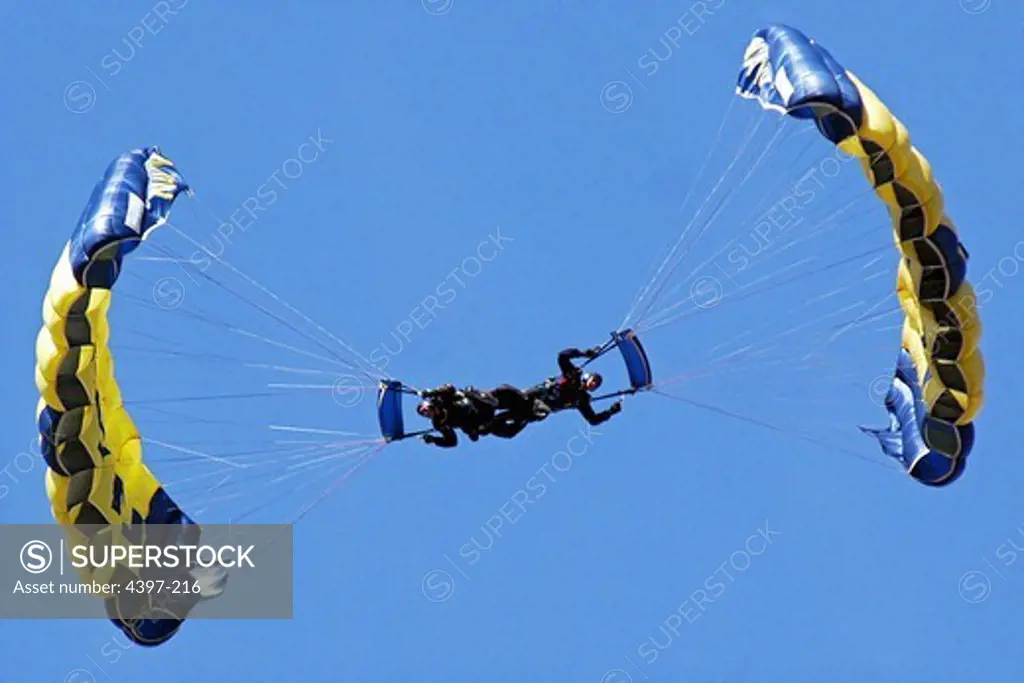 U.S. Navy Parachute Team Leap Frogs Descend into San Diego's Qualcomm Stadium