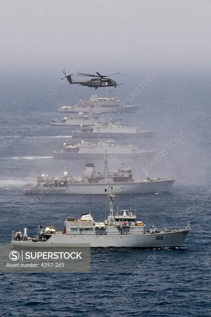 Helicopter Accompanies British, Pakistani and U.S. Mine Countermeasures Ships