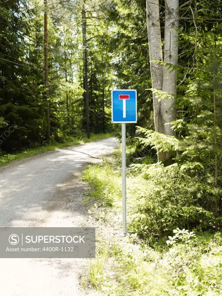 A traffic sign on a forest road, Sweden.