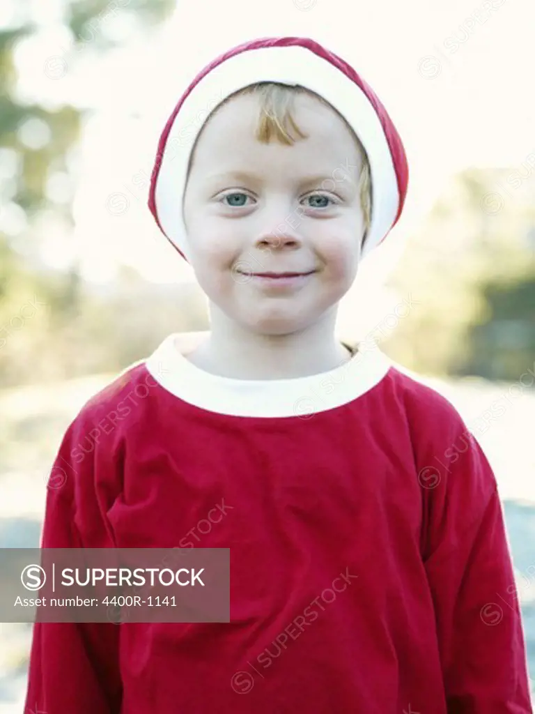 A boy dressed as Santa Claus, Sweden.