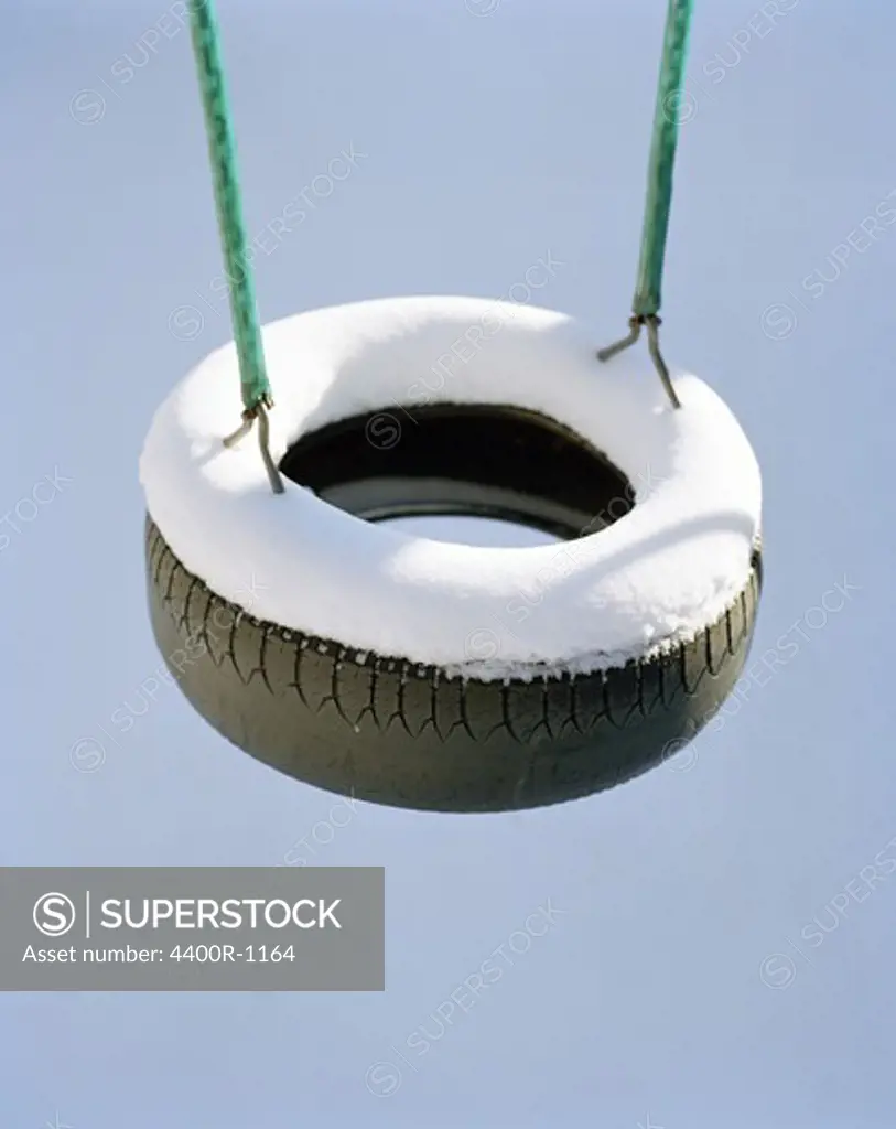 A swing covered with snow, Sweden.