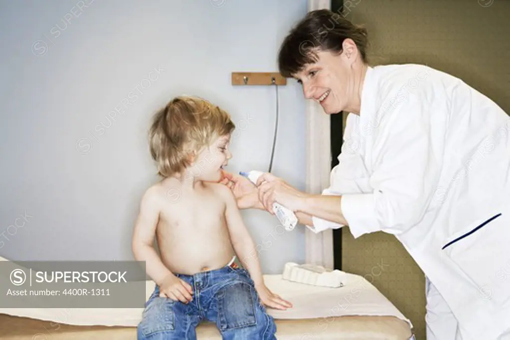 A boy on a medical examination, Sweden.