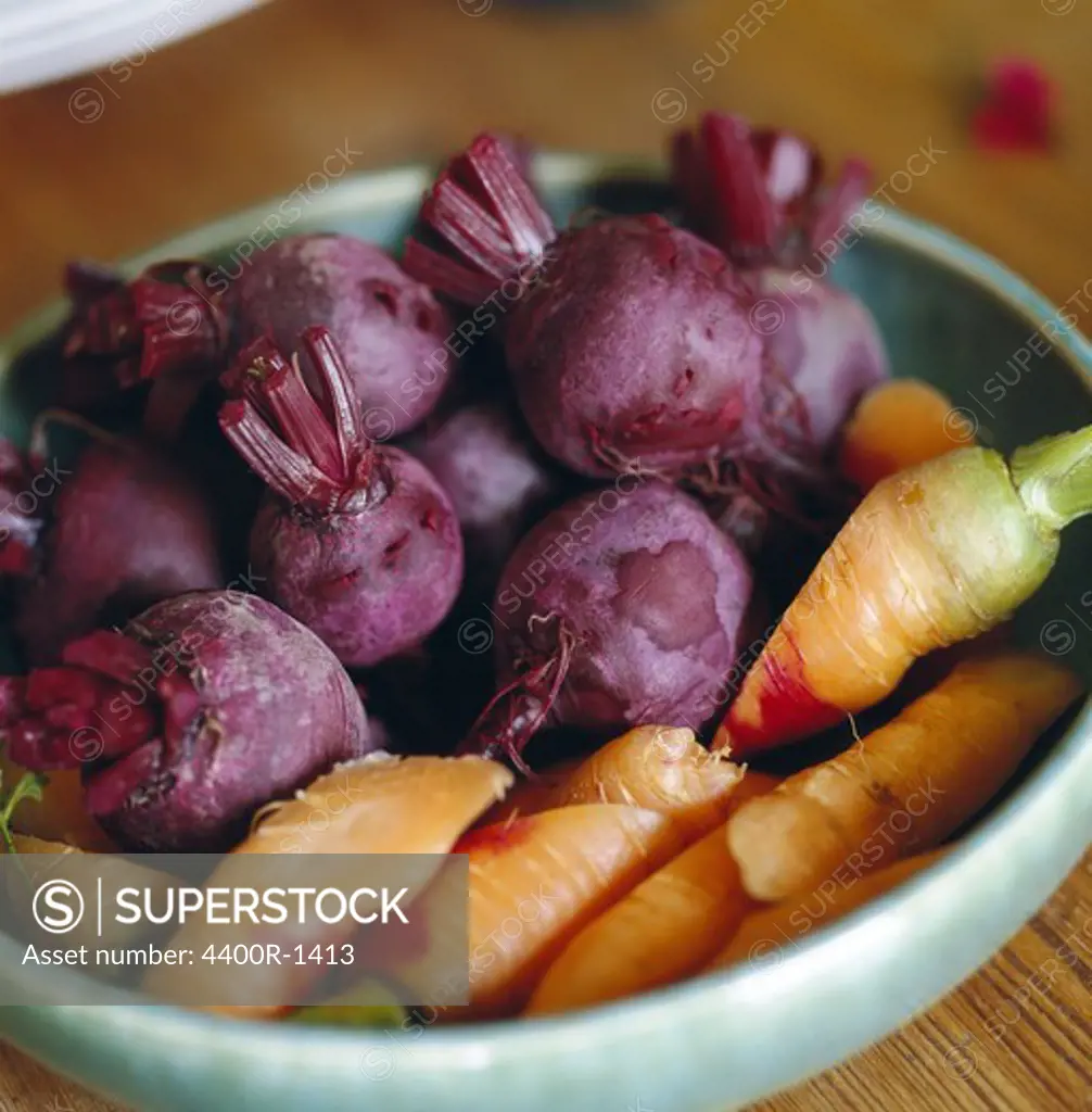 Root vegetables in a bowl, close-up.