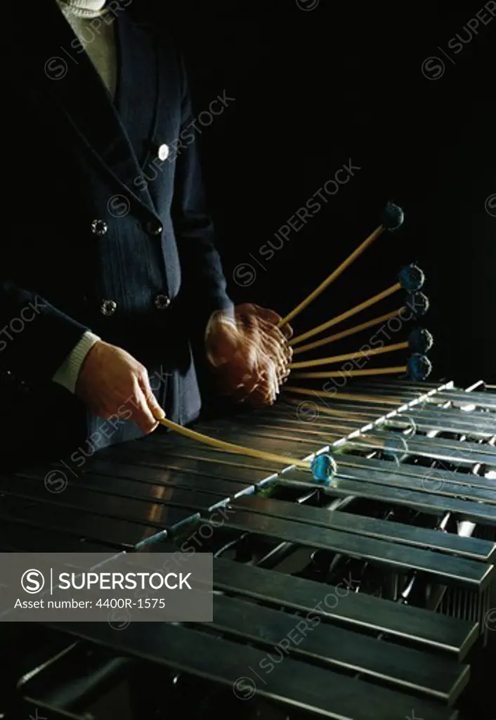 A man playing vibraphone.