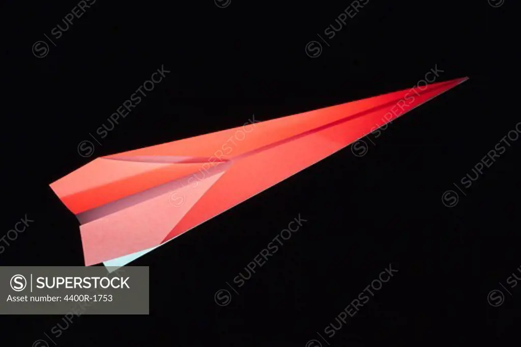 Paper airplane, close-up.