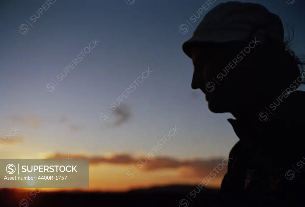 Silhouette of a man in the sunset, Arizona, USA.