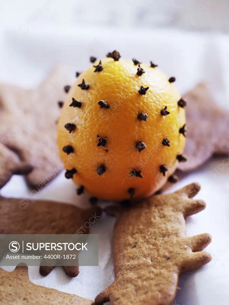 Gingerbread by an orange decorated with clove, Sweden.