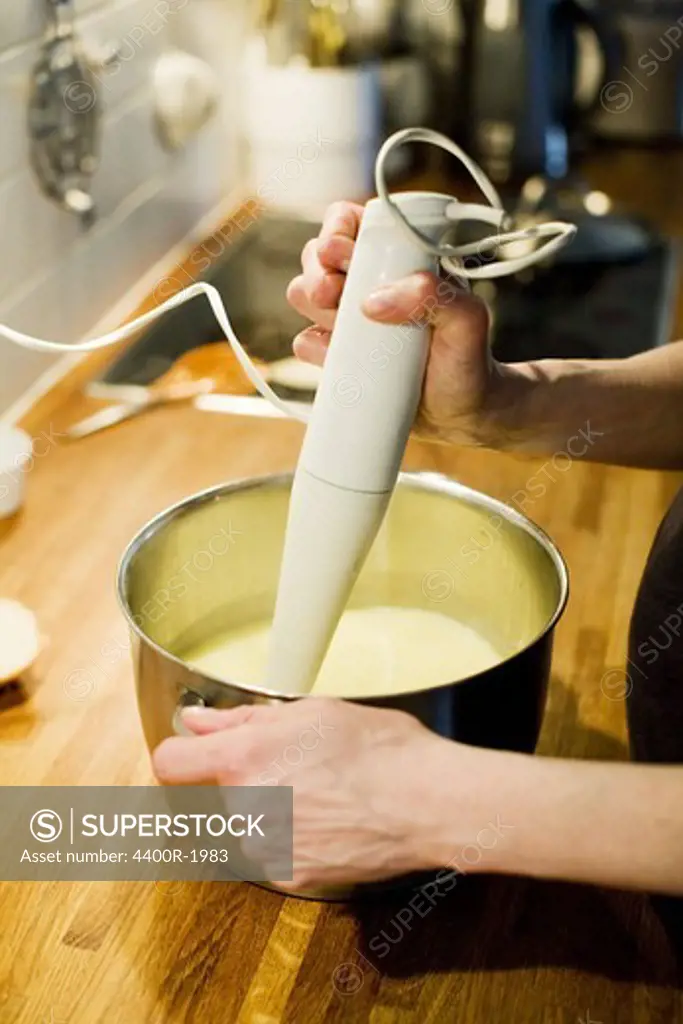 A woman making potato soup, Sweden.