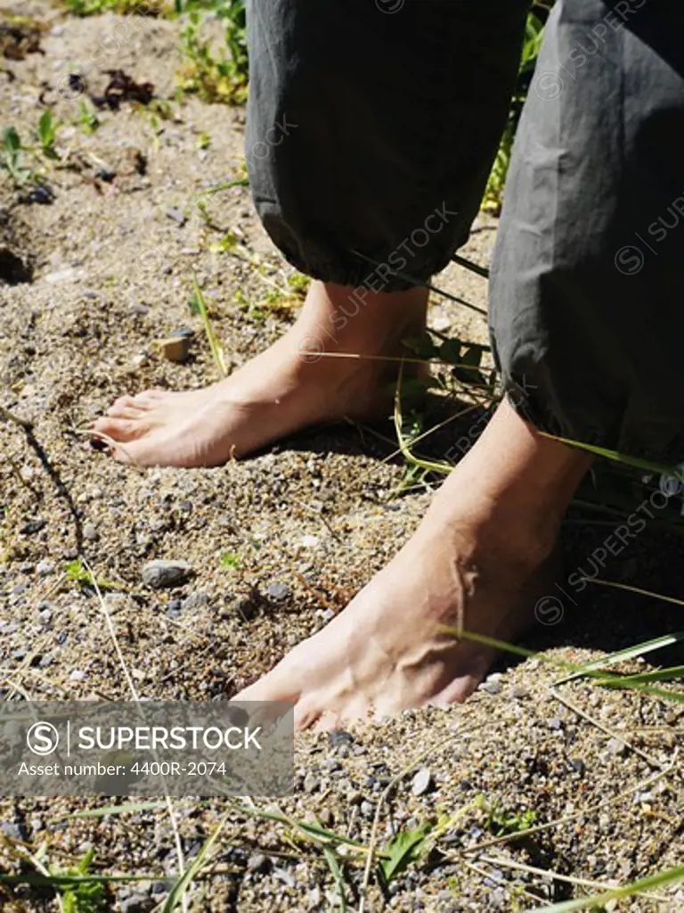 Bare feet on the beach, Sweden.