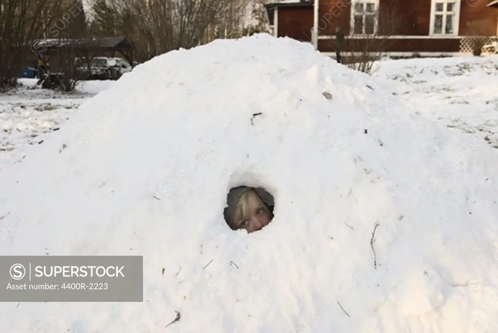 Child in an igloo, Sweden.