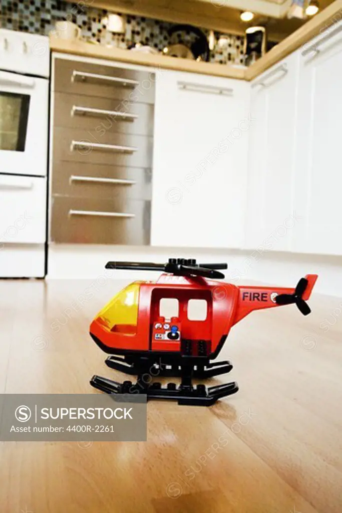 Toy helicopter ina kitchen, Sweden.