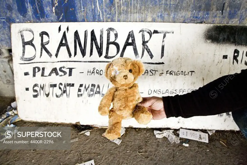 A teddy bear in a refuse dump, Sweden.