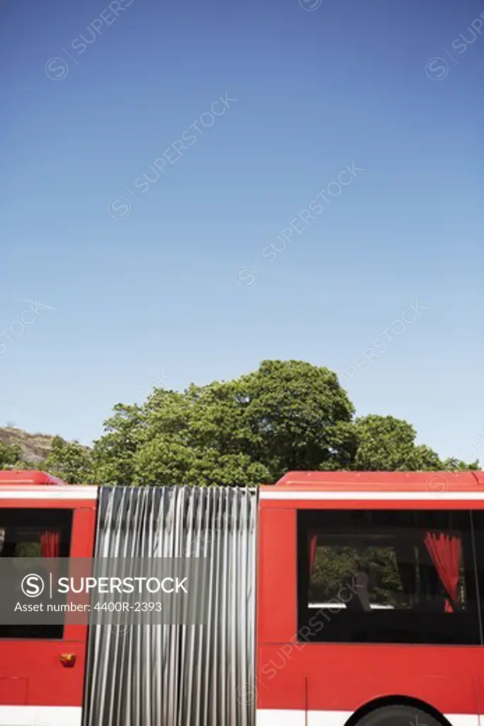 A part of a red bus passing, Stockholm, Sweden.