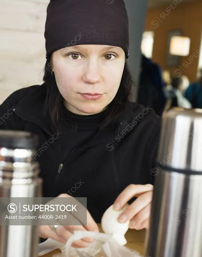 A woman having lunch, Harjedalen, Sweden.