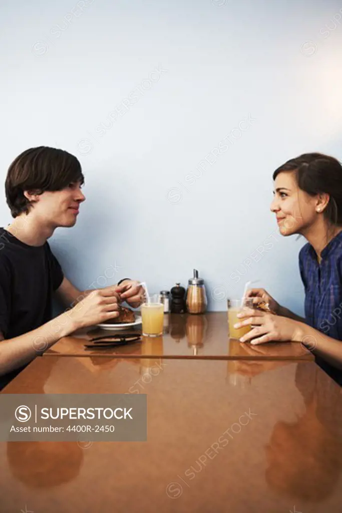 A young couple in a cafe, Sweden.