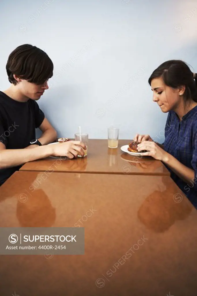 A young couple in a cafe, Sweden.