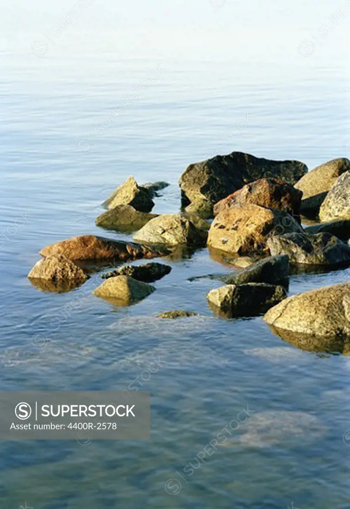 Rocks by the sea in the morning sun, Sweden.