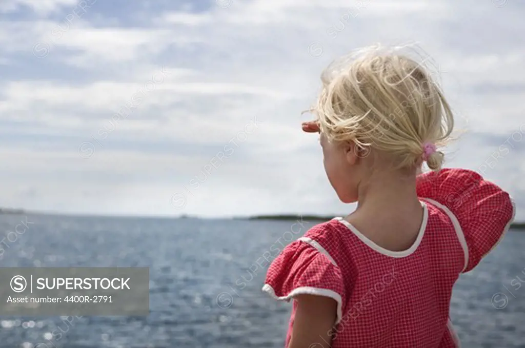 A girl by the ocean, Sweden.