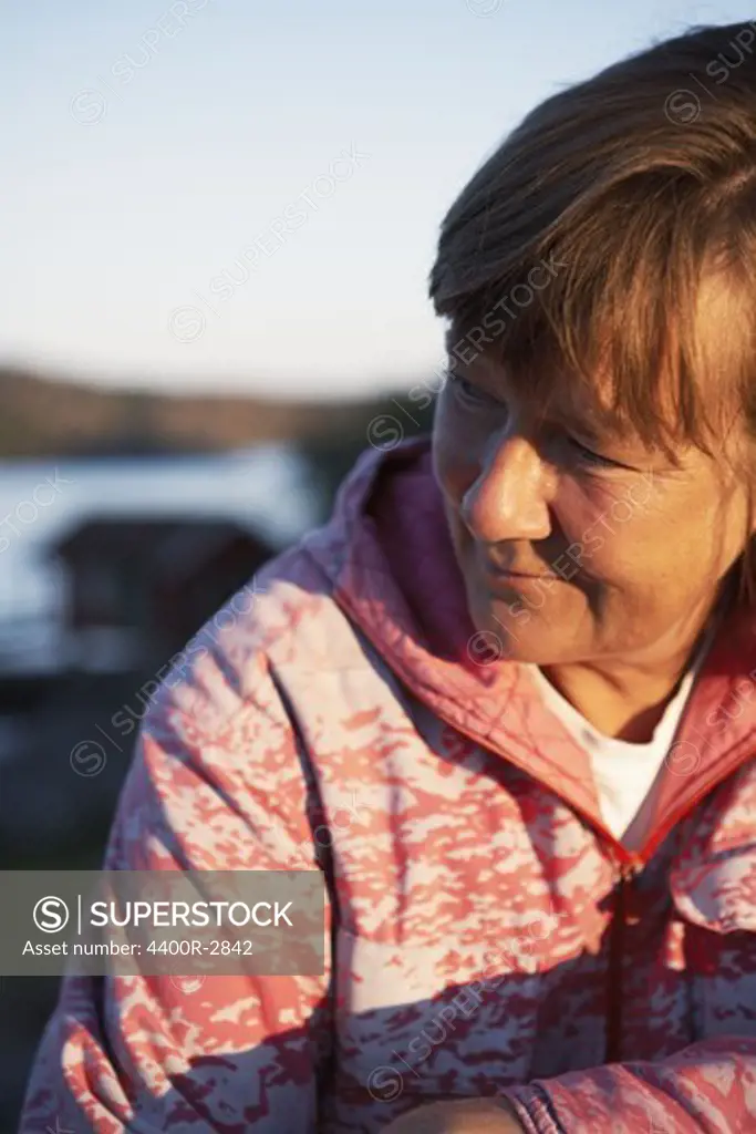 Portrait of a woman by the sea, Sweden.