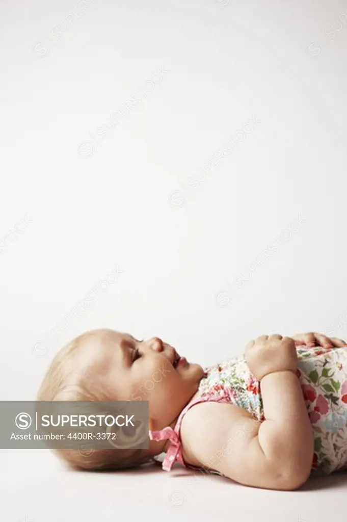 Portrait of a baby in a studio.