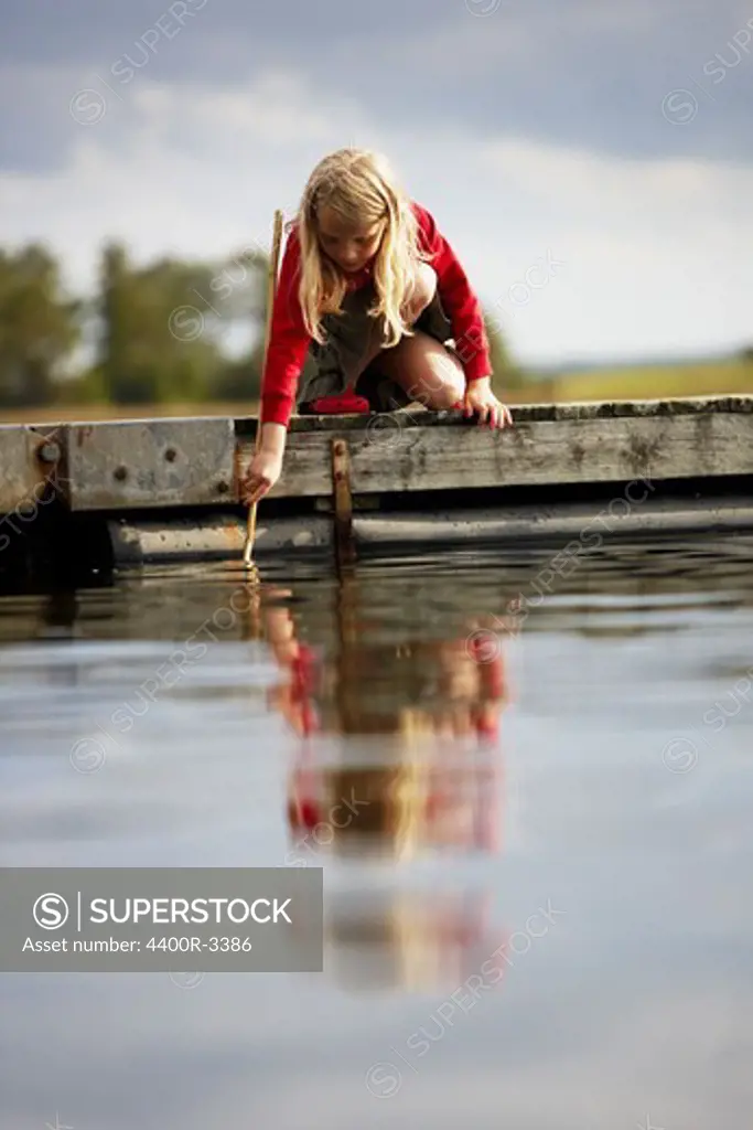 A girl by the water, Sweden.
