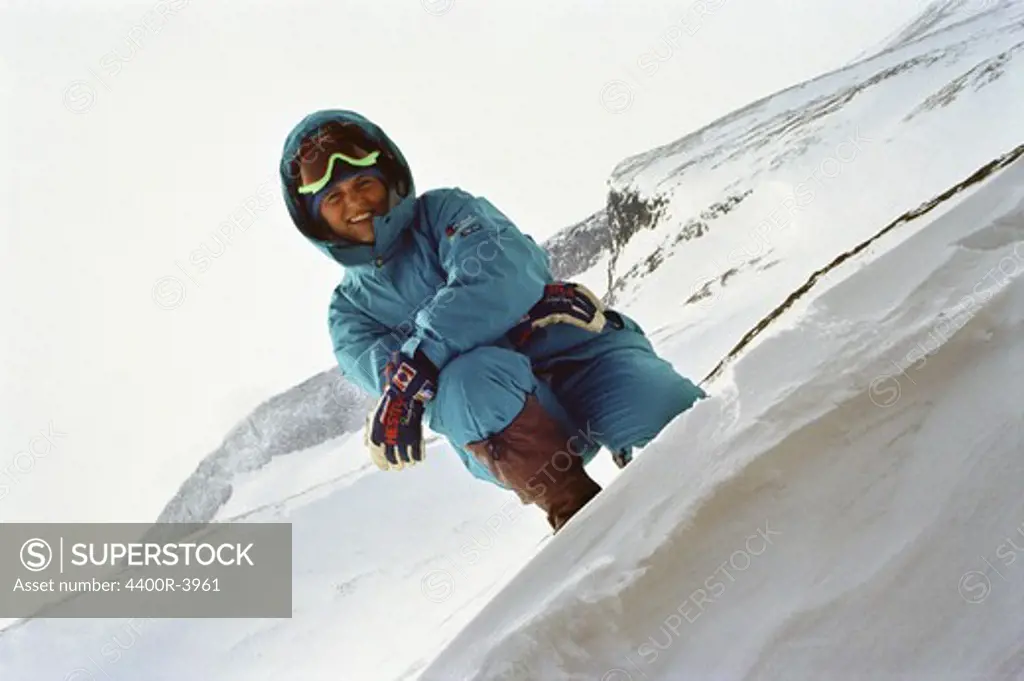 Portrait of a woman in a ski slope.