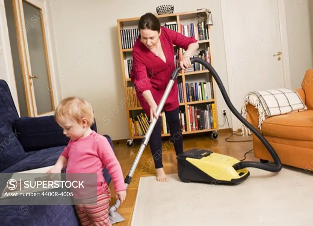 Woman vacuuming, Sweden.