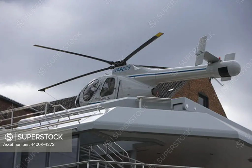 Helicopter on roof of boat