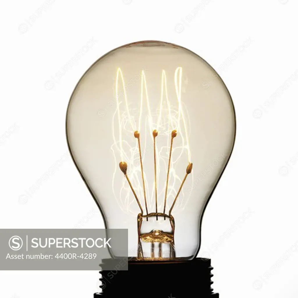 View of electric bulb against white background