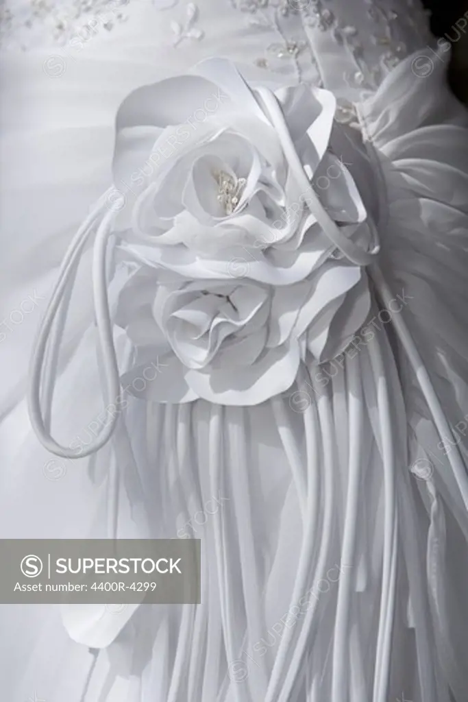 Detail of flower on wedding dress