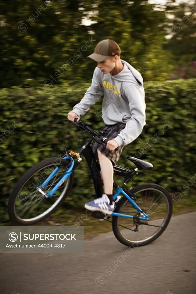 Teenage boy on bike
