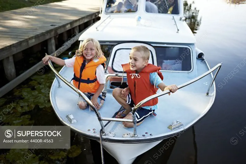 Children sitting in boat