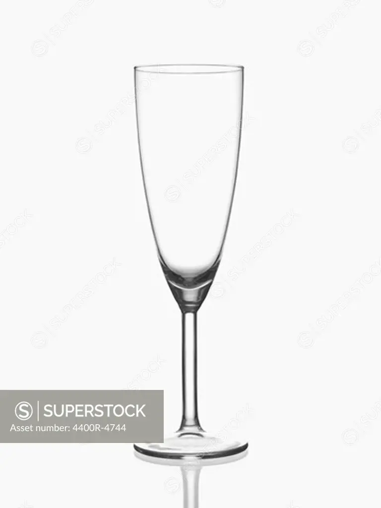 Champagne flute against white background