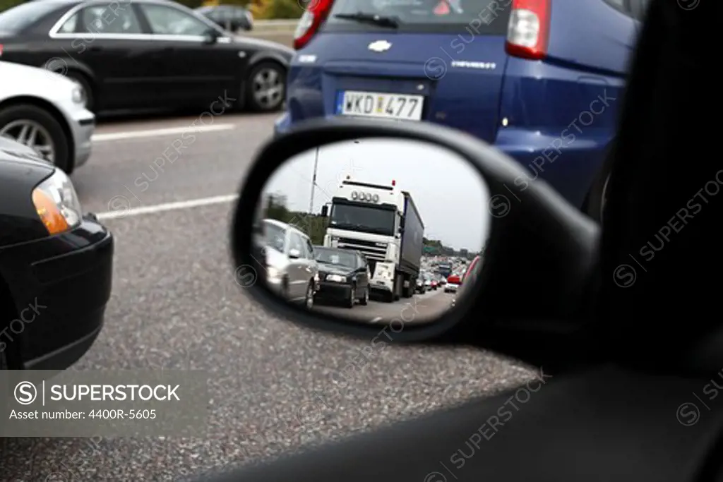 Line of cars in a wig mirror, Sweden.