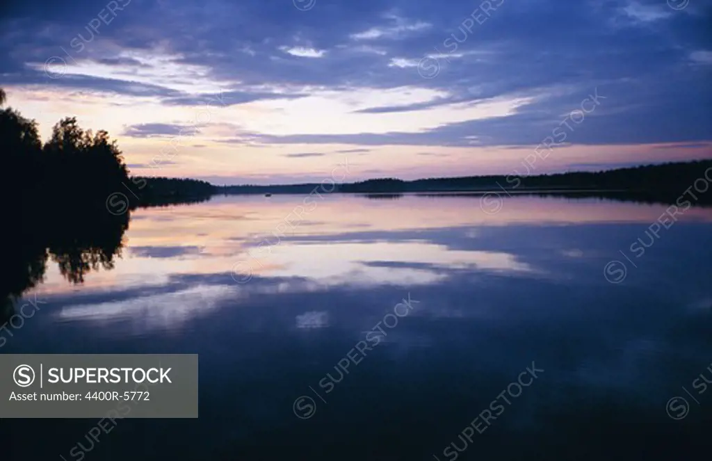 Sunset over a river, Sweden.