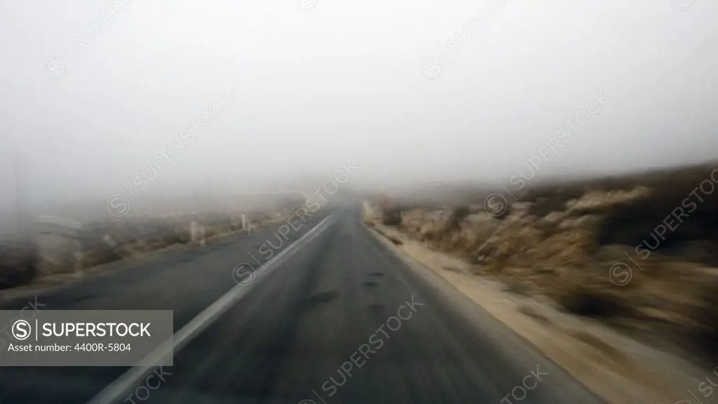 Misty mountain road, Amorgos, Greece.
