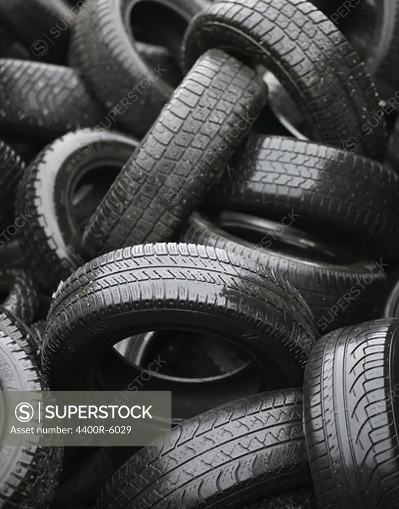 Car tyres at a dump, Sweden.