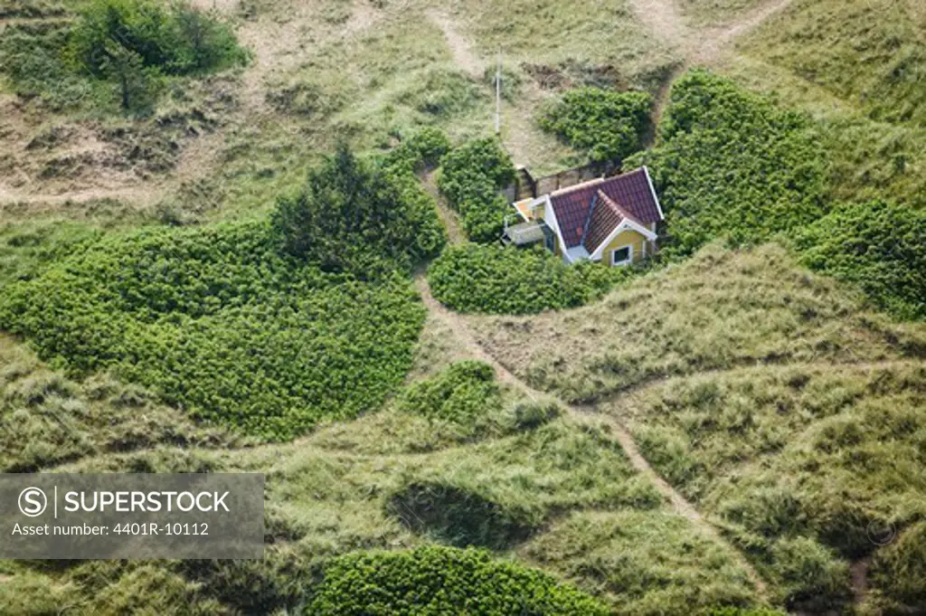 A cottage in sand dunes