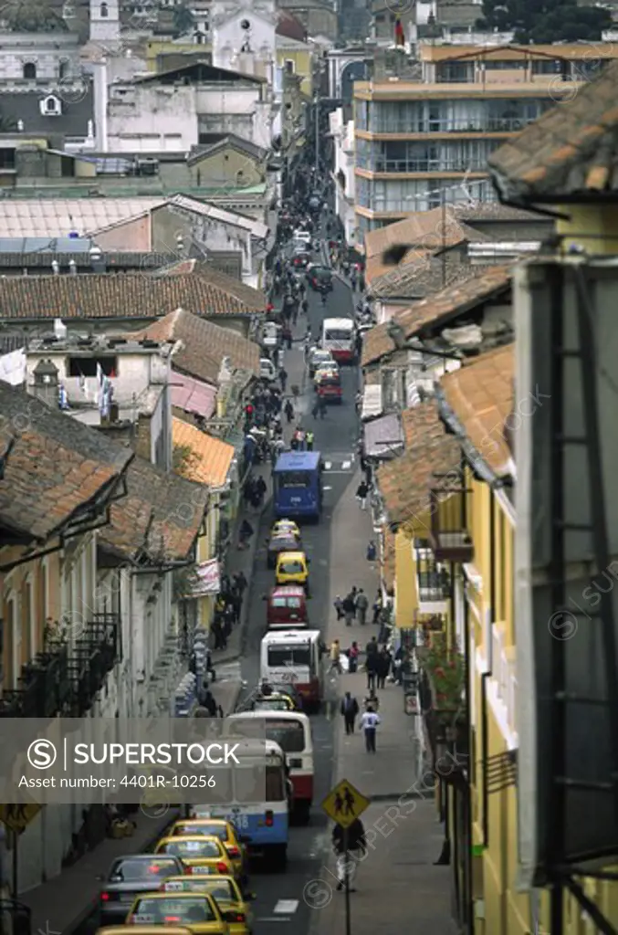 Traffic on a narrow road in Quito, Ecuador.